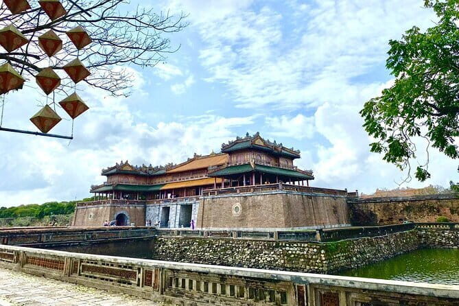 Full day Authentic Biking Green Hue Tour - Stop 2: Phu Cam Cathedral and Vietnam-War History