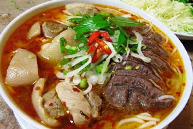 Half-Day Guided Street Food Walking Tour at Hue - Stop 4 at Quán Cẩm: bún bò Huế with beef, pork, or crab meat