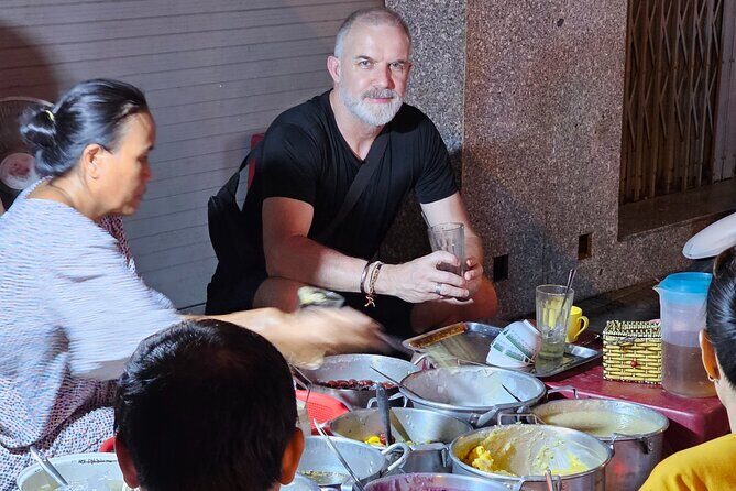 Hue Food Tour: Central Vietnam Culinary Heritage (Small Group) - Stop 2: Perfume River vibes and Bun Hen (spicy baby clam noodles)