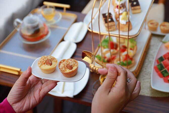 Huong River Afternoon Tea Cruise Tour Along Hue City - Afternoon tea on the water: snacks, fruit, and dessert