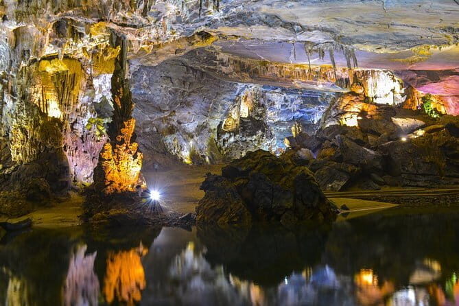 Phong Nha Cave & Paradise Cave Full-Day Exploration from Hue - Paradise Cave: tram start, steps, and that electric-car help