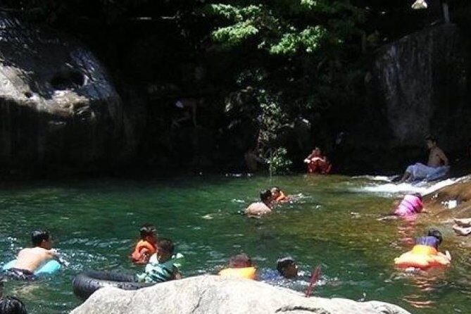 Transfer Hue to Dn/Hoi An via Hai Van & Springs (or Vice Versa) - Elephant Springs: a cool reset with a waterfall-fed pool